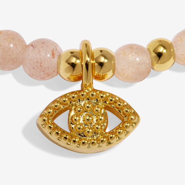 Joma Jewellery Protection bracelet charm close up gold plated detail