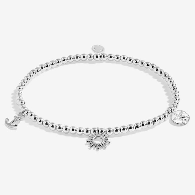 Silver beaded stretch anklet with ocean-inspired charm details
