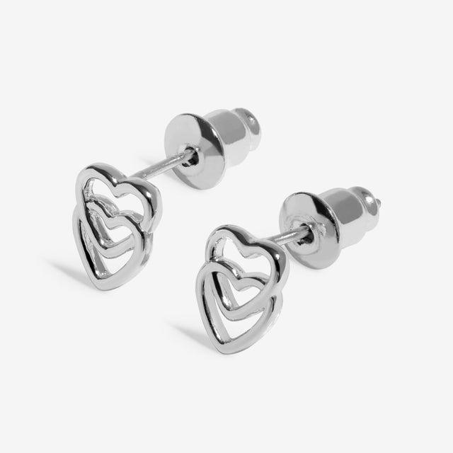 Double heart silver stud earrings sister jewellery detail