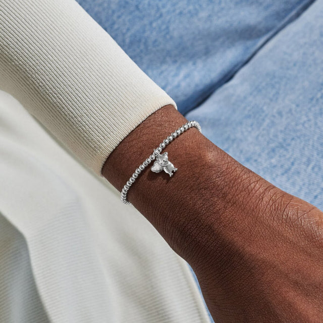 Joma A Little Welcome To The World silver bracelet worn on wrist