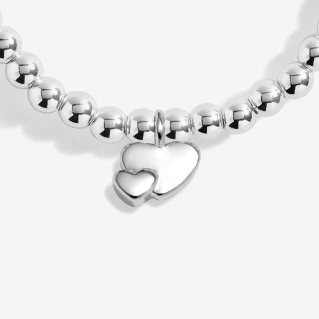 Double silver heart charm on Wonderful Mum charm bracelet