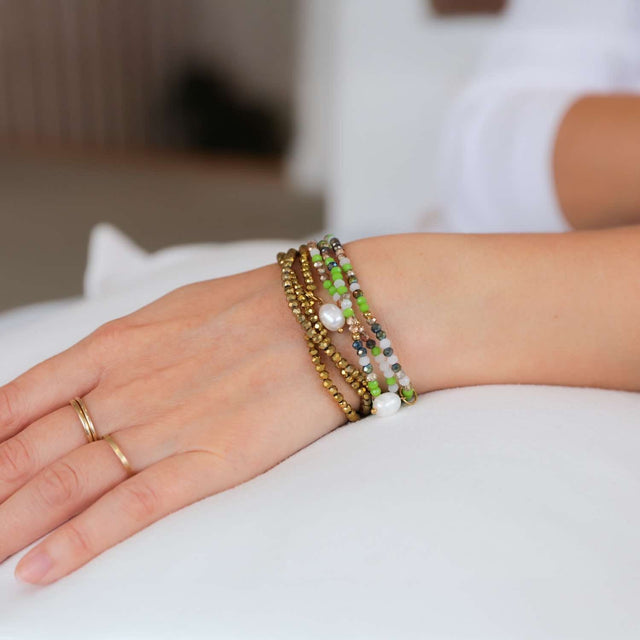 Detail of Kiki Green Oracle crystal jewellery beads and pendant charm