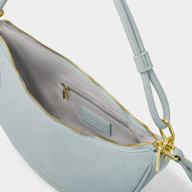 Katie Loxton Asha Sling Bag - Blue Mist Suedette