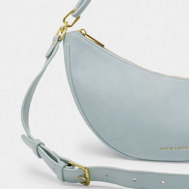 Katie Loxton Asha Sling Bag - Blue Mist Suedette