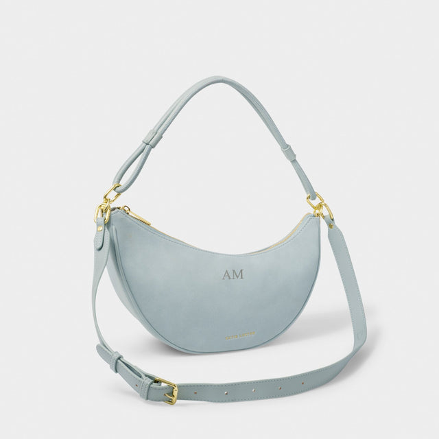 Katie Loxton Asha Sling Bag - Blue Mist Suedette