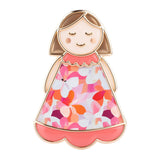 Close up of Lucky Little Ladies Friend enamel pin badge keepsake gift with colourful dress design.
