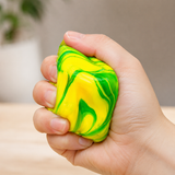 Marble Cube sensory fidget toy being squeezed in hand for stress relief, anxiety reduction and improved focus