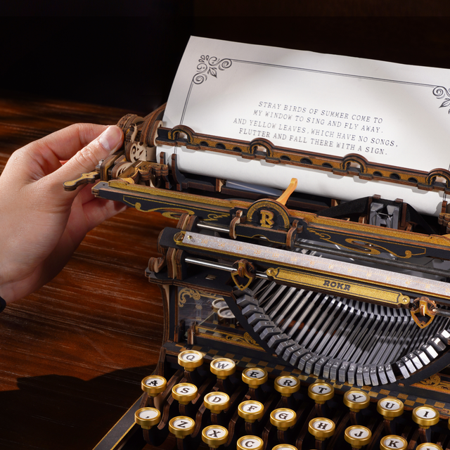 Mechanical typewriter wooden model kit for adults in black and gold