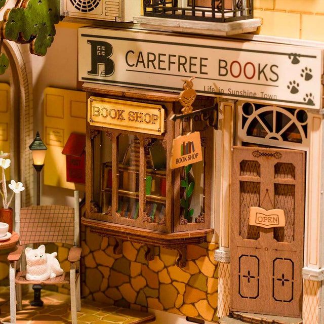 Sunshine Town miniature bookshelf insert with warm lighting