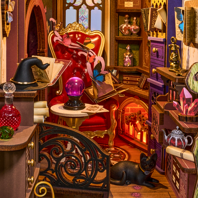 Close-up detail of Rolife kits Magic Fantasy Corner miniature wizard library interior and fireplace lighting