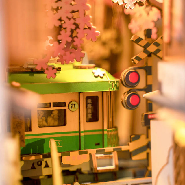 Sakura Densya miniature book nook with tram and bridge detail