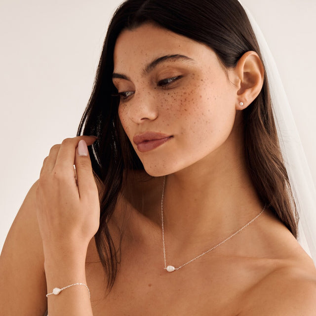 Silver pearl bracelet paired with matching necklace