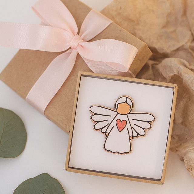 Splosh Angel of Guidance pin presented in a gift box with pink ribbon, perfect for a thoughtful guardian angel gift.