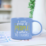 Splosh Cheeky Mug No Thanks sitting on a table beside a plant – humorous blue mug for introverts who love quiet mornings and witty coffee cups.