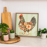 Splosh Cottage Grove Green Hen Framed Canvas by Splosh displayed in kitchen.