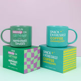 Splosh Cheeky Mugs displayed with bright gift boxes, featuring the green caffeine mug with cheeky quote – perfect novelty gift for coffee lovers.