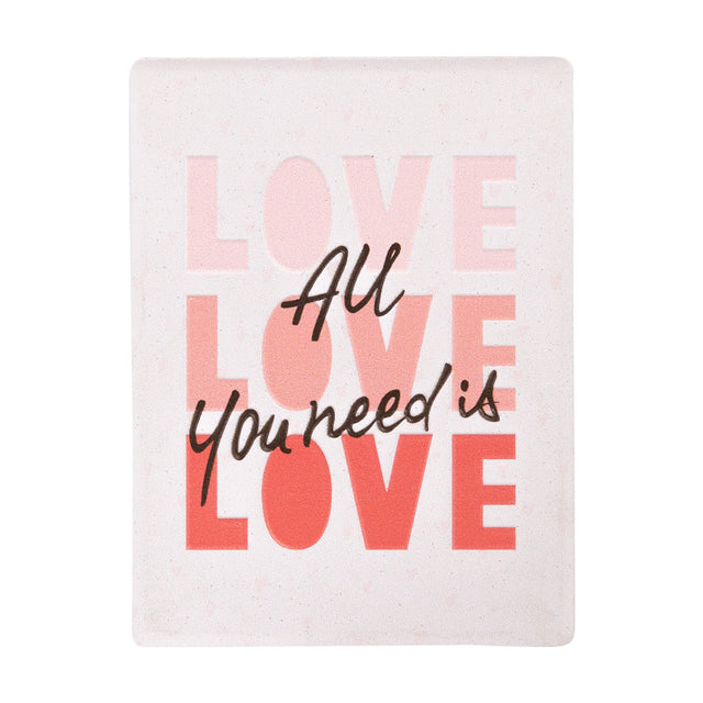 Valentine’s Day ceramic magnet with “All you need is love” message
