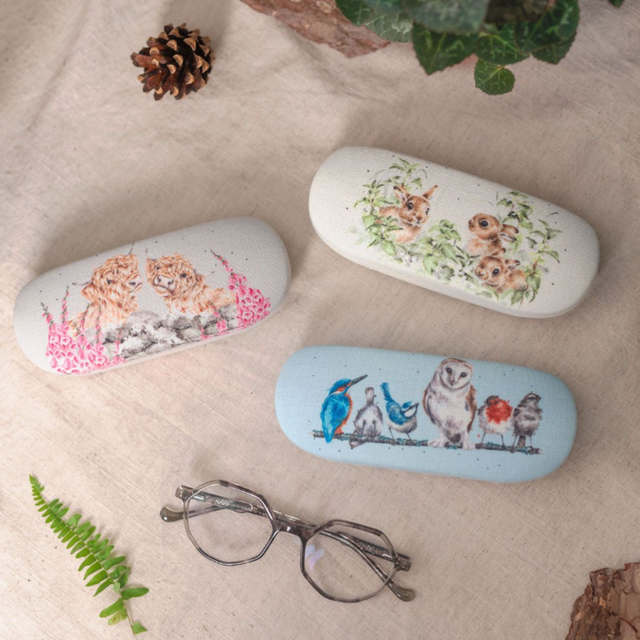 Wrendale Designs Just for Moo glasses case protecting sunglasses on table with another glasses case in the range
