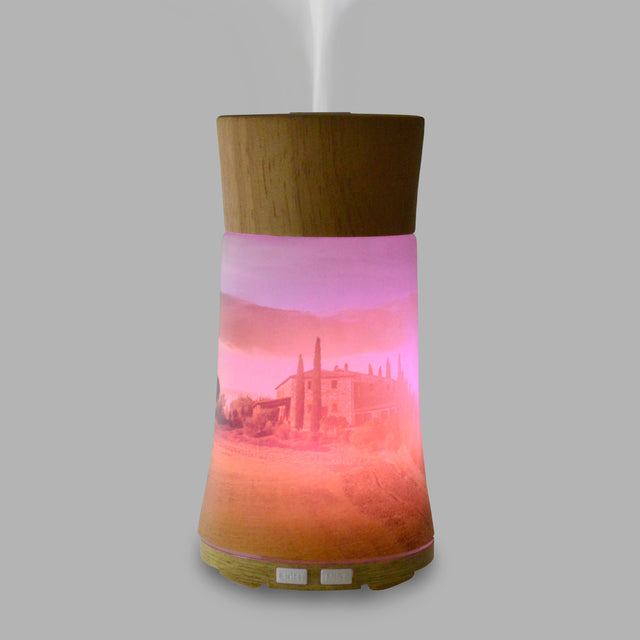 Our Ultrasonic Diffuser is designed to help you relax with your favourite Di Palomo fragrance with the added benefits of aromatherapy. Displaying a beautiful view of a Tuscan vineyard, made from the finest hand-crafted glass and including a mood-enhancing colour changing light, this diffuser is sure to create a sense of calm and relaxation in your home.