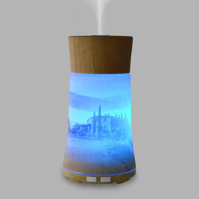 Our Ultrasonic Diffuser is designed to help you relax with your favourite Di Palomo fragrance with the added benefits of aromatherapy. Displaying a beautiful view of a Tuscan vineyard, made from the finest hand-crafted glass and including a mood-enhancing colour changing light, this diffuser is sure to create a sense of calm and relaxation in your home.