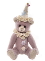 Minnelli is a 10.5" Teddy bear with a five-way jointed body sewn from wool and plush. Her face comes together with a hand-stitched nose, airbrushing and soulful glass eyes backed with ultrasuede disks for an adorable love me look. Minnelli wears a lace neck ruff and lovely clown hat with matching pom poms that dot her tummy. 